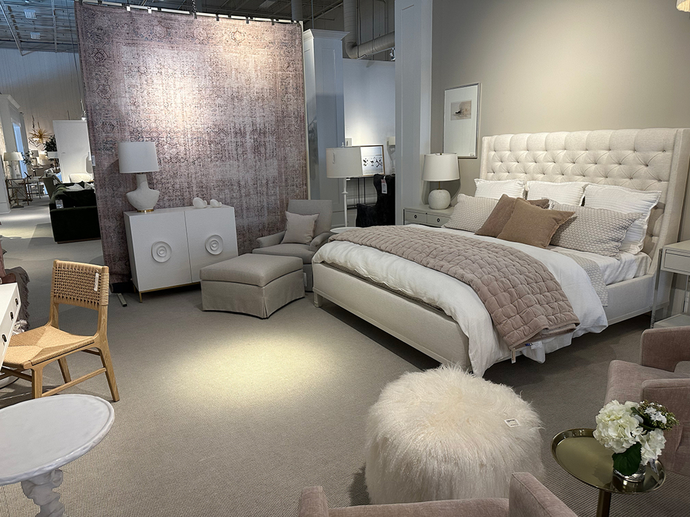 Bedroom with tufted headboard